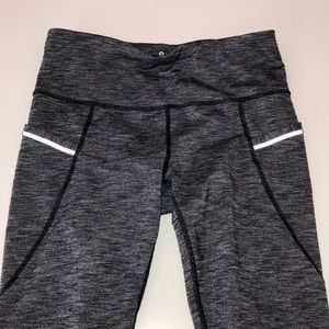 Athleta Gray And Black side pocket mesh leggings